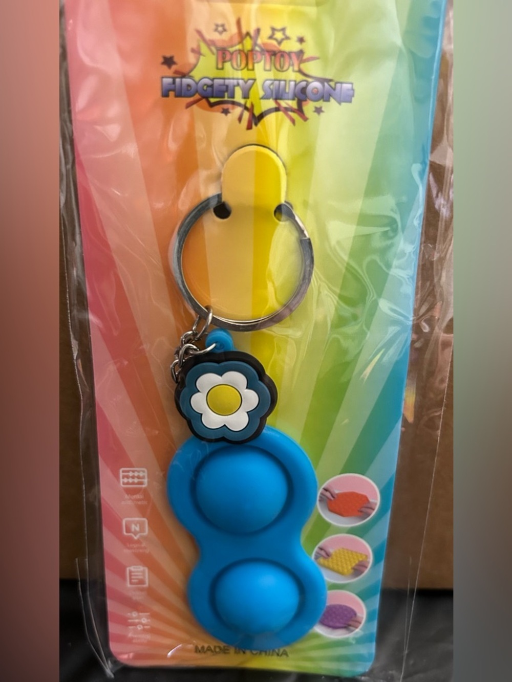 Blue Silicone Fidget Keychain with Daisy Charm
